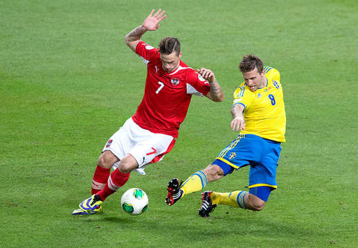 Sveriges Anders Svensson och Österrikes Marko Arnautovic
