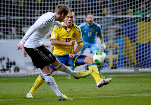 Tysklands André Schürrle vrider in 3-5