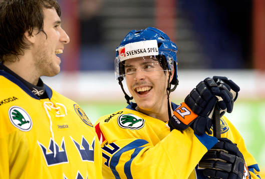 Sveriges Sebastian Erixon och målvakt Henrik Karlsson