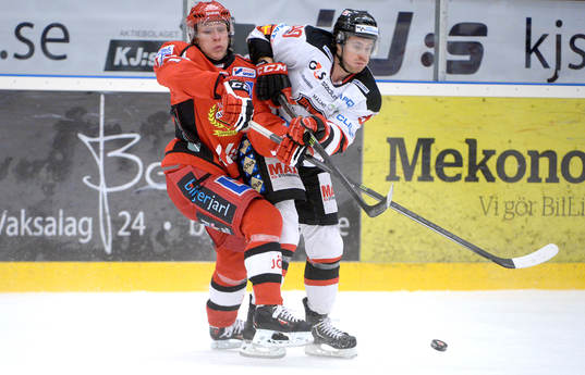 Almtunas Jesper Olofsson och Malmö Redhawks Mattias Persson