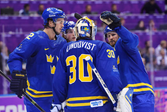 Sveriges Jonathan Ericsson, målvakt Henrik Lundqvist och
