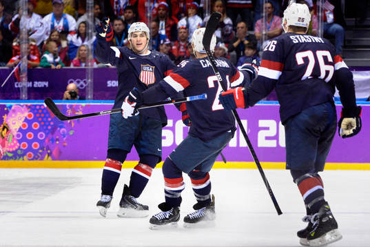 s TJ Oshie (tv) gratuleras