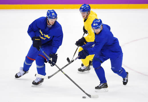 Jonathan Ericsson, Gustav Nyquist och Daniel Sedin på