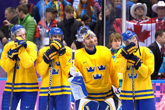 Sveriges Alexander Edler, Johnny Oduya, målvakt Henrik