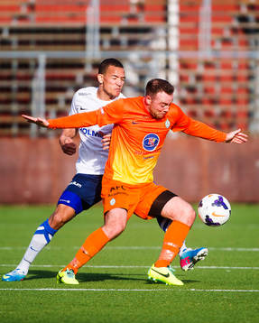 Norrköpings Edvard Skagestad  och AFC Uniteds Ben Everson