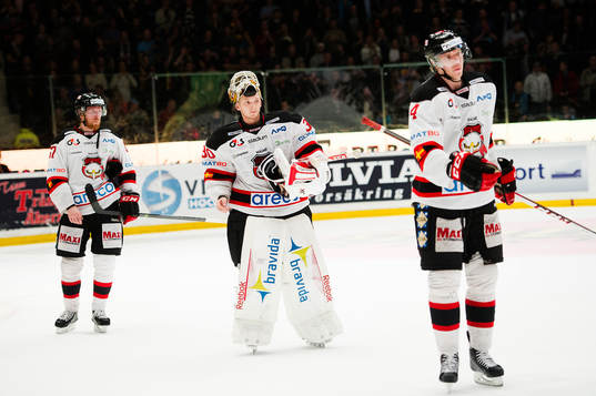 Malmö Redhawks Calle Andersson, målvakt Robin Rahm och
