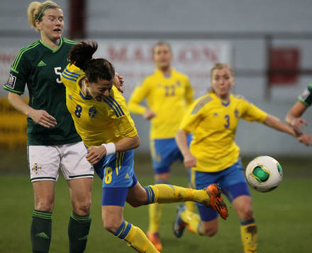 Sweden's Lotta Schelin and Northern Ireland's Julie Nelson