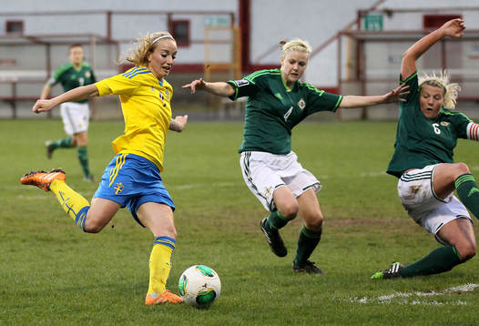 Sweden's Kosovare Asllani and Northern Ireland's Nadene