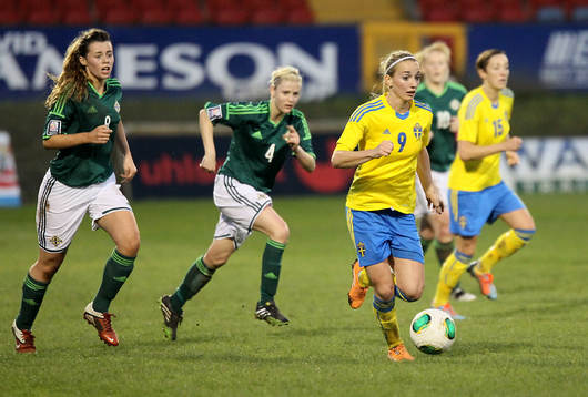 Sweden's Kosovare Asllani and Northern Ireland's Laura