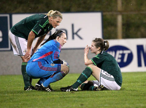 Northern Ireland's Lisa Armour suffers a facial injury