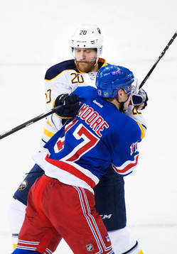 Buffalos Henrik Tallinder tacklar New Yorks John Moore