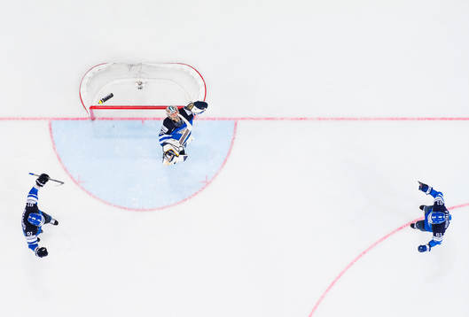 Finlands Iiro Pakarinen, målvakt Pekka Rinne och Tommi
