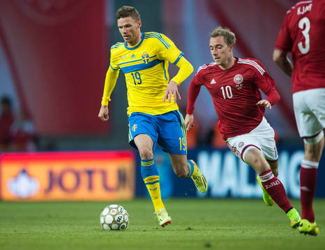 Sveriges Marcus Berg och Danmarks Christian Eriksen i