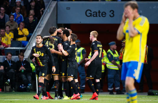 Spelare i Belgien jublar