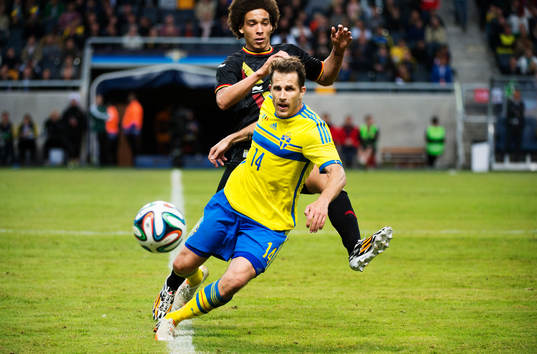 Sveriges Tobias Hysén och Belgiens Axel Witsel