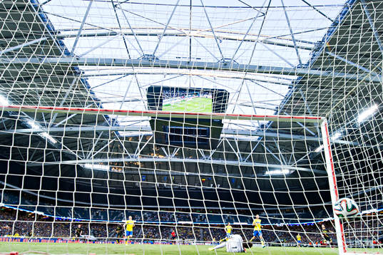 Belgiens Romelu Lukaku gör 0-1 bakom Sveriges målvakt