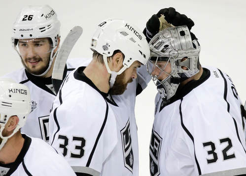 Los Angeles Kings defensemen Slava Voynov (26) and Willie