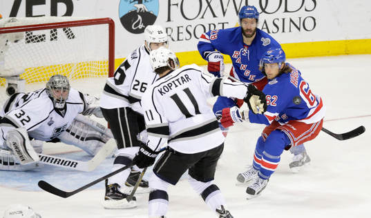 Los Angeles Kings defenseman Slava Voynov (26) and New York