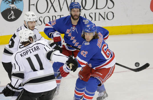 Los Angeles Kings defenseman Slava Voynov (26) and New York