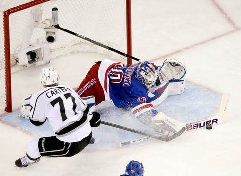 New York Rangers goalie Henrik Lundqvist (30) stops a