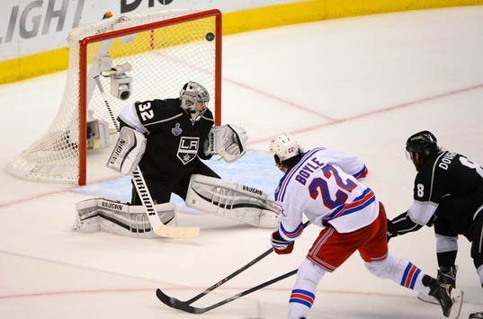 New York Rangers Center Bryan Boyle scores a goal against