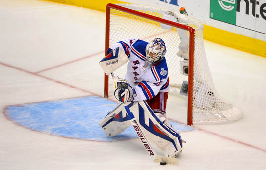 New York Rangers goaltender Henrik Lundqvist shoots the puck