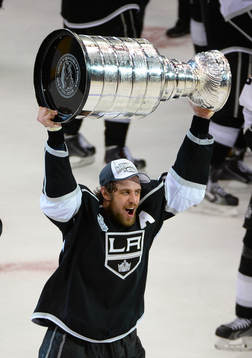 Anze Kopitar of the Los Angeles Kings lifts the Stanley Cup