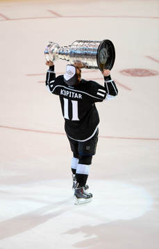 Anze Kopitar of the Los Angeles Kings lifts the Stanley Cup