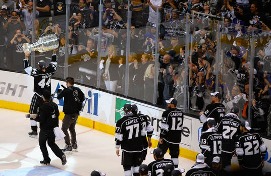 The Los Angeles Kings take the Stanley Cup around the ice