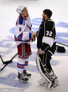 Anton Stralman of the New York Rangers shakes the hand of