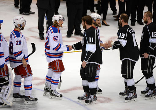 Carl Hagelin of the New York Rangers shakes the hand of