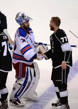 Henrik Lundqvist of the New York Rangers shakes the hand of