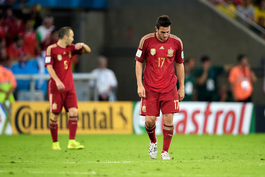 Spaniens Andres Iniesta och Koke deppar