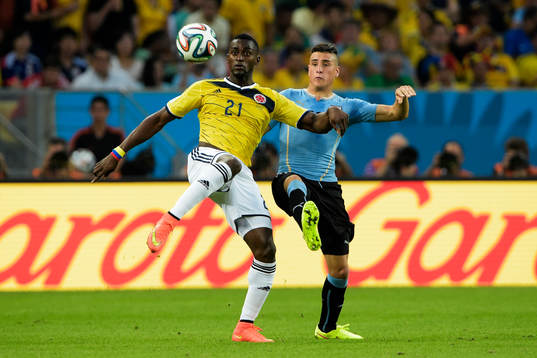 Colombias Jackson Martinez och Uruguays Jose Gimenez