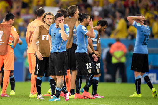 Uruguays Cristian Rodriguez gråter