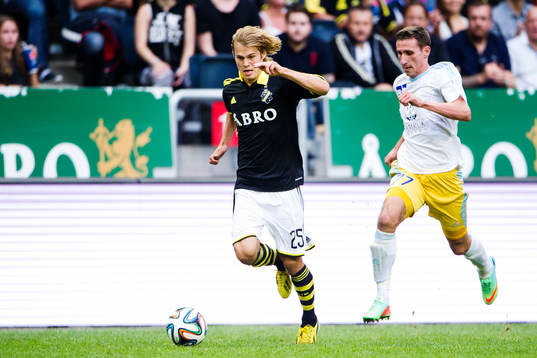 s Sam Lundholm jagas av Astanas Dmitry Shomko