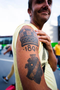 En supporter har en AIK tatuering