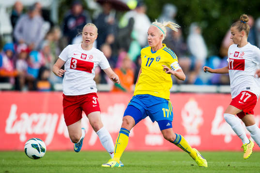 Sveriges Caroline Seger och Polens Paulina Dudek och