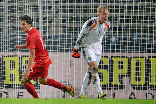 Turkiets Enes Unal jublar