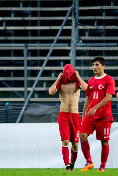 Turkiets Salih Ucan och Muhammed Demirci deppar