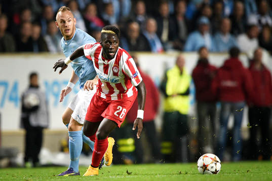 Olympiacos Arthur Masuaku och Malmö FFs Magnus Eriksson