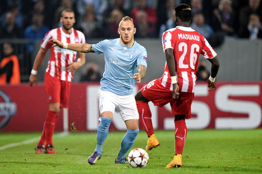 Malmö FFs Magnus Eriksson och Olympiacos Arthur Masuaku