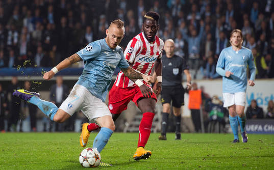 Malmö FFs Magnus Eriksson och Olympiacos Arthur Masuaku