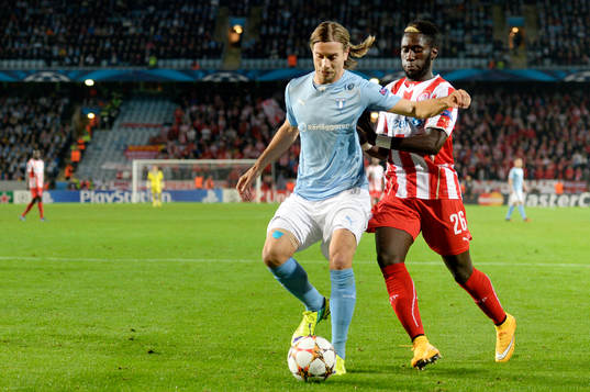 Malmö FFs Markus Halsti och Olympiacos Arthur Masuaku