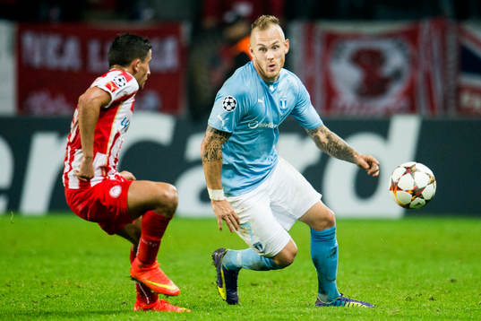 Malmö FFs Magnus Eriksson och Olympiacos Omar Elabdellaoui