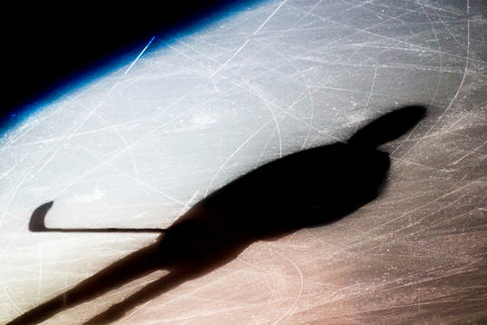 Skugga av en ishockeyspelare