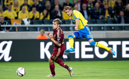 Sveriges Ola Toivonen och Rysslands Dmitri Kombarov