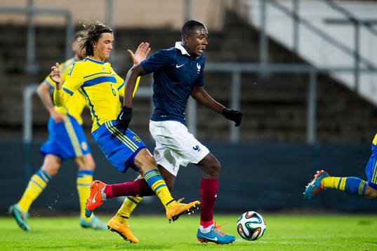 Sveriges Kristoffer Olsson och Frankrikes Samuel Umtiti