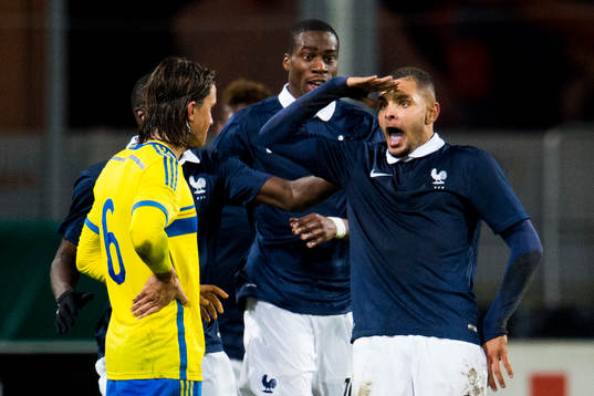 Frankrikes Layvin Kurzawa jublar mot Sveriges Kristoffer