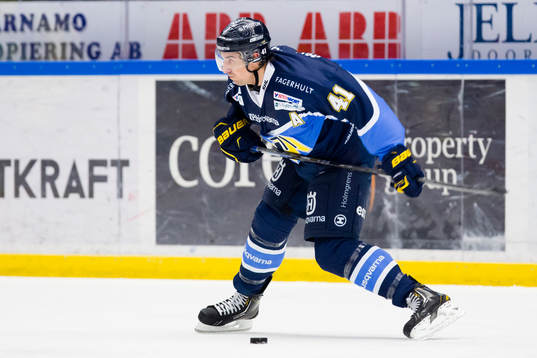 s Chris Campoli skjuter